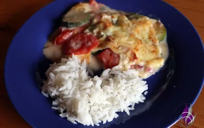 Reis mit Tomaten und Zucchini in Béchamelsauce